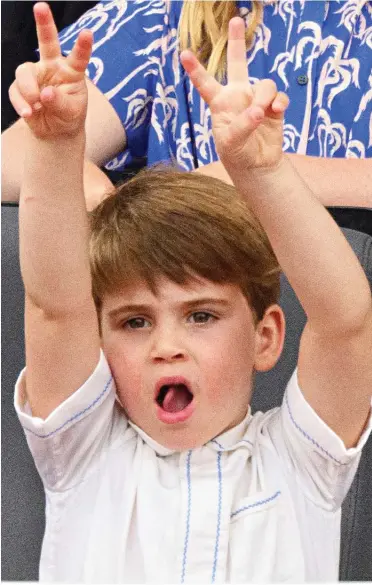  ?? ?? V for Victory: Louis waves his arms in delight watching the brilliant Jubilee pageant