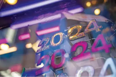  ?? AP PHOTO/YUKI IWAMURA ?? Glasses celebratin­g the new year are displayed Friday ahead of New Year’s Eve in Times Square in New York.