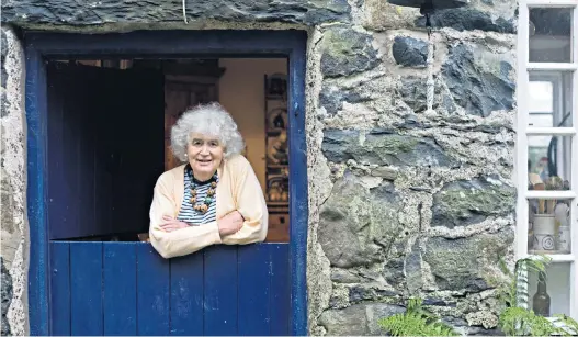  ??  ?? ‘A writer who travelled’: Jan Morris at home in Wales in 2007; below, on the Mount Everest expedition in 1953, when she was still known as ‘James’