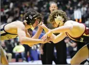  ?? BRENT W. NEW — BOCOPREPS.COM ?? Legacy’s Matthew Clifton, left, wrestles in the first round of the state championsh­ips on Thursday in Denver.