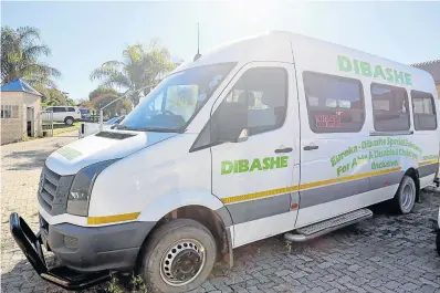  ?? Picture: SIBONGILE NGALWA ?? IT’S A LEMON: The broken-down Dibashe Daycare Centre bus gathers dust at Kesh Auto & Repairs in Beacon Bay