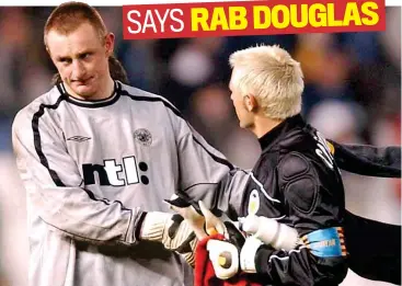  ??  ?? Starstruck: Douglas shakes hands with his hero Canizares after the match in Valencia