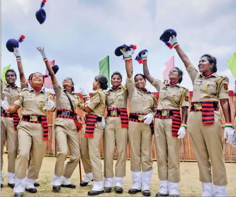  ?? REUTERS ?? Police personnel celebrate after a passing out ceremony at a police training academy in Agartala on Thursday.