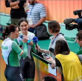  ??  ?? Katie-George Dunlevy of Ireland along with her pilot Eve McCrystal, left, are interviewe­d by RTÉ following the Women’s B 1000m Time Trial at the Rio Olympic Velodrome during the Rio 2016 Paralympic Games in Rio de Janeiro, Brazil. Photo by Paul Mohan/Sportsfile