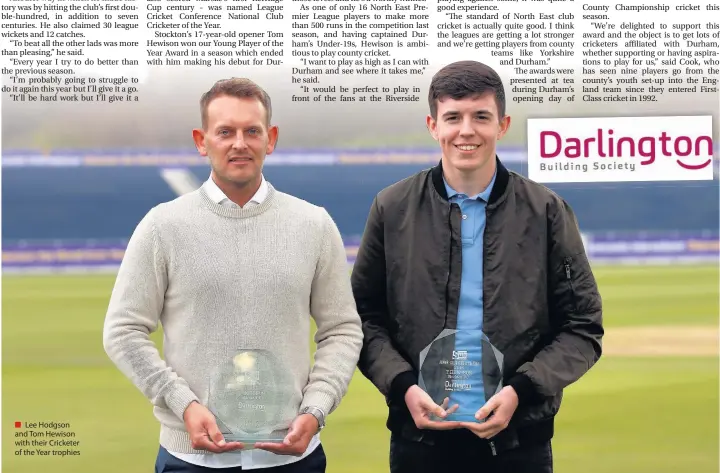  ??  ?? Lee Hodgson and Tom Hewison with their Cricketer of the Year trophies