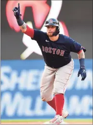  ?? Emilee Chinn / Getty Images ?? The Red Sox’s Christian Vazquez celebrates his double in the ninth inning against the Cleveland Indians on Saturday.