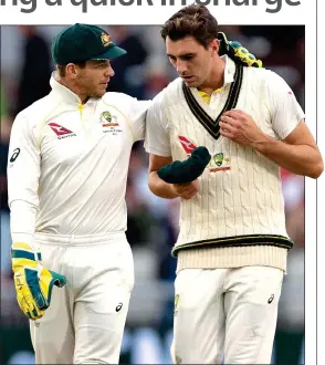  ?? ?? OVER TO YOU, PAT: Cummins takes over the captaincy from Tim Paine (left)