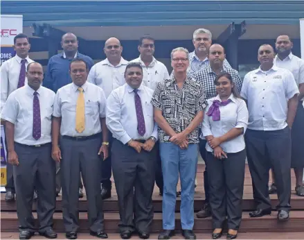  ?? Kathrin Krishna. ?? Acting chief executive officer HFC Bank in Fiji Raj Sharma (3rd from left, front row), Consultant, private sector operations department of Asian Developmen­t Bank Roger Packham (4th from left) with other participan­ts at the HFC Bank and Asian...