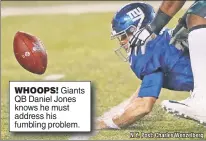  ??  ?? WHOOPS! Giants QB Daniel Jones knows he must address his fumbling problem.