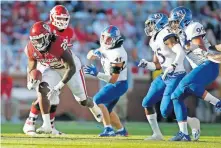  ??  ?? Oklahoma's Rhamondre Stevenson (29) ran for 104 yards and two touchdowns on 11 carries Saturday in the Sooners' 62-9 win over Kansas. [BRYAN TERRY/ THE OKLAHOMAN]