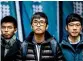  ?? — AFP ?? Leading democracy activists ( from left) Joshua Wong, Nathan Law and Alex Chow outside the court in Hong Kong on Tuesday.