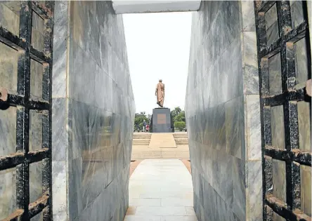  ??  ?? LOOKING BACK A statue of Ghana’s first president Kwame Nkrumah, seen from his mausoleum at Nkrumah Memorial Park.