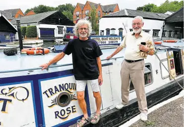  ?? ?? James Scowen (left) with David Atkinson – who had previously crewed on the Tranquil Rose ( TR) – seen at the TR reunion at Braunston Marina in August 2023. James’ ageing rock star looks hide a hotel boat operator of outstandin­g ability in all fields, which allowed him to survive 13 years as owner/operator.