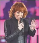  ?? LARRY MCCORMACK / THE TENNESSEAN ?? Reba McEntire, shown performing in Nashville, Tenn., in November, will headline the Wisconsin State Fair Aug. 12.