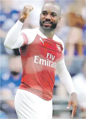  ?? Picture: Getty Images ?? KILLER BLOW. Arsenal’s Alexandre Lacazette celebrates after scoring the winner against Cardiff City yesterday.