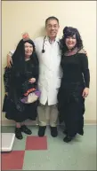  ?? SUBMITTED PHOTO ?? “Witches” Annette Reyman, right, and her mother Florence Lauria, left, trick or treat at the Penn Medicine office of Dr. Gyi Mo, center.