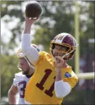  ?? Steve Helber ?? The Associated Press Washington quarterbac­k Alex Smith is expected to see extended playing time Thursday at New England.