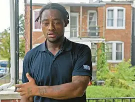  ?? KIM HAIRSTON/BALTIMORE SUN ?? Dontay Jones, of Edmondson Village, father of Nykayla Strawder, talks about the fatal shooting of his 15-year-old daughter. Nykayla was on her front porch with friends Saturday night when she was shot in the head. Police on Sunday identified the suspected shooter as a 9-year-old boy who dropped the gun and fled the scene after the shooting.