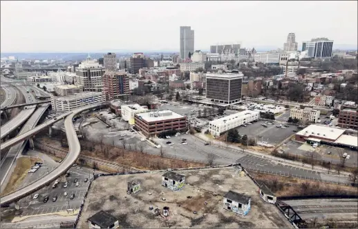  ?? Will Waldron / Times Union ?? Central Warehouse is seen from above Colonie Street on Wednesday in Albany. Knocking down the building is on Chris Churchill’s list of projects Albany should consider undertakin­g with some of the money coming from the federal stimulus bill.