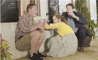  ??  ?? BIG DISCOVERY: John Cena, Leslie Mann and Ike Barinholtz, from left, play parents who try to stop their kids from keeping a sex pact on prom night.