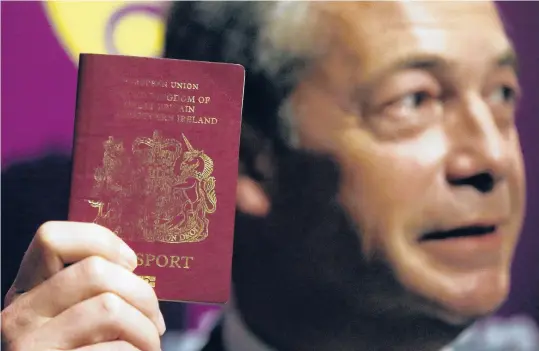  ?? FRANKAUGST­EIN/AP2016 ?? Starting Friday, Britain will have a more-distant relationsh­ip with the European Union because of Brexit. Above, UK Independen­ce Party leader Nigel Farage, a leading figure in advocating Britain’s breakaway from the EU, shows off a British passport.