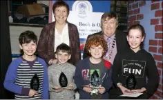  ??  ?? St. Senan’s PS: Bobby Rackard, Aaron Brady, Tom Ivers and Liz O’Shea, winners of the Under 11 section pictured with Mary McManus (teacher) and Pat O’Shea.