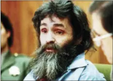  ?? FILE — THE ASSOCIATED PRESS ?? In this 1986file photo, Charles Manson is seen in court. Amid reports that Manson has been taken from his California prison cell to a hospital, a state correction­s official would confirm only that the 82-year-old killer and cult leader was still alive. Shown below is how Manson looks today.