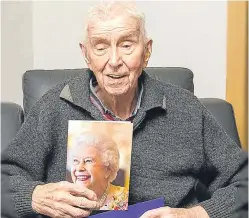  ?? Pictures: Vicki Wightman. ?? Jim Crombie celebrates his 108th birthday, top, and with his telegram from the Queen, above.