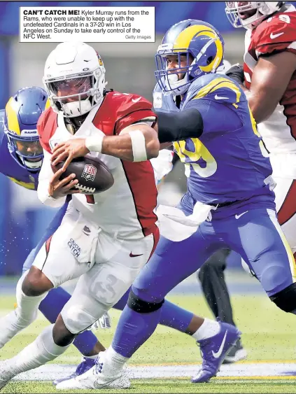  ?? Getty Images ?? CAN’T CATCH ME! Kyler Murray runs from the Rams, who were unable to keep up with the undefeated Cardinals in a 37-20 win in Los Angeles on Sunday to take early control of the NFC West.
