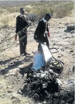  ??  ?? Pupils of Mohlope Primary School at Mpheti village near Burgersfor­t are seen dumping human waste.