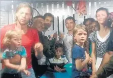  ?? ASCOM/ SEGUP ?? ADAM HARTEAU, left, his wife, Emily Harteau, right, and their two daughters are seen Wednesday after being rescued in Brazil.