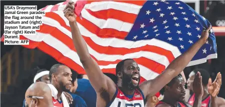  ?? Picture: AFP ?? USA's Draymond Jamal Green parades the flag around the stadium and (right) Jayson Tatum and (far right) Kevin Durant.