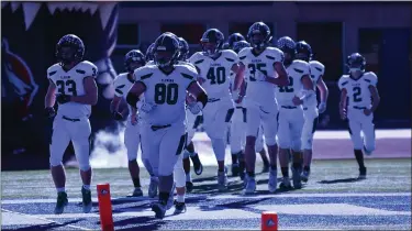  ?? OTSPORTSCH­EK — COURTESY PHOTO ?? The Fleming Wildcats take the field at Thunder Bowl Stadium for the 6-man state championsh­ip football game.