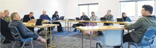  ?? PHOTO: KERRIE WATERWORTH ?? To be or not to be . . . Wanaka Community Board members listen as Lakeland Adventures Wanaka director Michael Donald speaks during the public forum at the last meeting held in the Luggate temporary community hall.