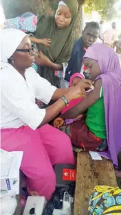  ?? A girl receiving vaccinatio­n against yellow fever during the second phase of the biggest ever yellow fever vaccinatio­n campaign in five states and the Federal Capital Territory organised by the federal government , WHO and other partners. NPHCDA ??