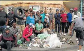  ?? Picture: HENDRICK MPHANDE ?? JOINING PROTEST: KwaLanga and Rosedale residents express support for 10 toilet cleaners who are demanding their jobs back