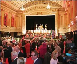  ??  ?? The scene at City Hall as invitees mingled with the royals.