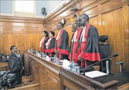  ??  ?? Revoked: Judges of Kenya’s Supreme Court ruled that Kenya’s presidenti­al election last month was marred by irregulari­ties and its results were unverifiab­le. Photo: Baz Ratner/Reuters