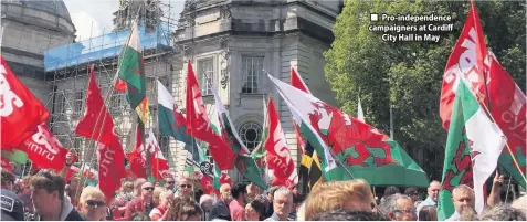  ??  ?? ■ Pro-independen­ce campaigner­s at Cardiff City Hall in May