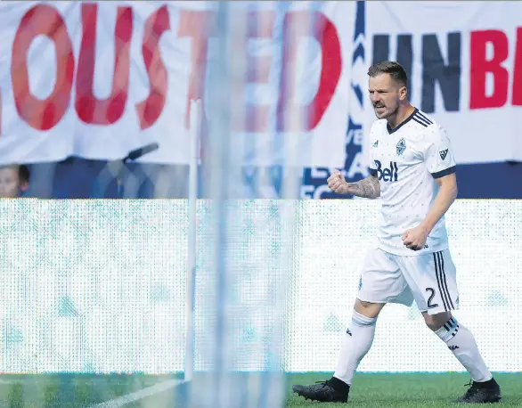  ?? THE CANADIAN PRESS/FILES ?? Vancouver Whitecaps’ Jordan Harvey celebrates his goal against New York City FC in July. The Whitecaps head into the second half of the Major League Soccer season feeling happy about where they are and the direction the team is heading, especially with...