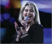  ?? ESTEBAN FELIX — THE ASSOCIATED PRESS ?? Olivia Newton-John performs in Chile in February 2017. The star of the 1978movie `Grease' died in August after a long battle with breast cancer.