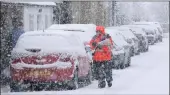  ?? PICTURE: PA ?? A postman in Braco, near Stirling, Scotland, does his rounds as blizzard conditions are set to bring ‘a real taste of winter to the whole of the UK’.