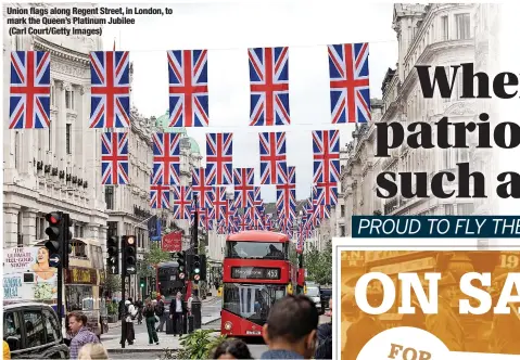  ?? ?? Union flags along Regent Street, in London, to mark the Queen’s Platinum Jubilee
(Carl Court/getty Images)