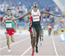  ?? FILES ?? Runner Mohammed Ahmed is targeting a podium finish at the world championsh­ips after placing fourth in the Olympics.