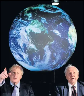  ??  ?? Prime Minister Boris Johnson (left) and Sir David Attenborou­gh at the launch of the next COP26 UN Climate Summit at the Science Museum, London – Q1