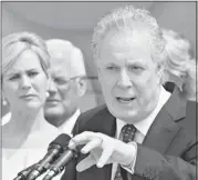  ?? Jacques Boissinot/the Canadian Press ?? Quebec Premier Jean Charest, right, launched his fourth electoral campaign Wednesday in Quebec City.