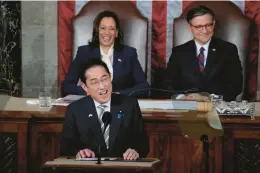  ?? JACQUELYN MARTIN/AP ?? Japan PM Fumio Kishida addresses a joint meeting of Congress on Thursday in Washington as Vice President Kamala Harris and Speaker Mike Johnson listen.