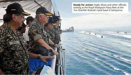  ??  ?? ready for action: Najib, Musa and other officials looking at the Royal Malaysian Navy fleet at the Tun Sharifah Rodziah naval base in Semporna.