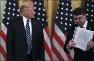  ?? ALEX BRANDON - ASSOCIATED PRESS ?? President Donald Trump watches as Veterans Affairs Secretary Robert Wilkie walks away after speaking about protecting seniors April 30 in the East Room of the White House, in Washington.