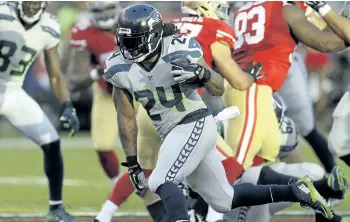  ?? BEN MARGOT/AP FILES ?? The Oakland Raiders have agreed to a two-year contract to bring running back Marshawn Lynch, pictured here with the Seattle Seahwaks, out of retirement.